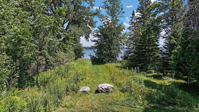 An absolute treasure, steps to Forest Lake-lake. Wonderfully - photo 30