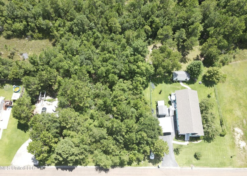 Prime .44 Acre Lot Near the Beach! Just a short walk from the - photo 2