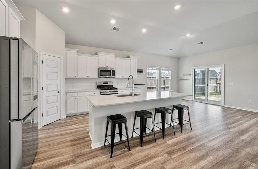 Welcome to 974 Arrowwood Way, a beautifully crafted home in the - photo 10