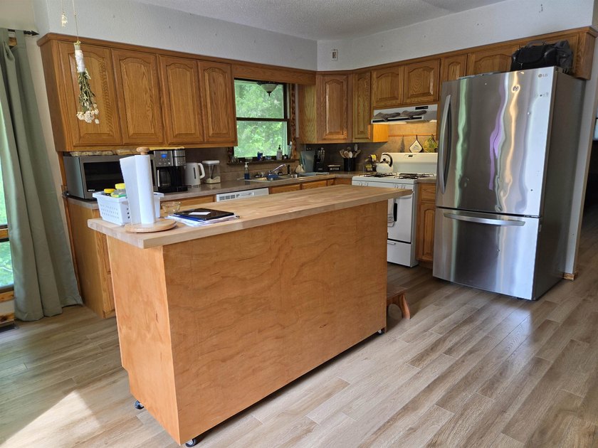 Lake Vagabond home with wraparound deck and patio. Privacy - photo 4