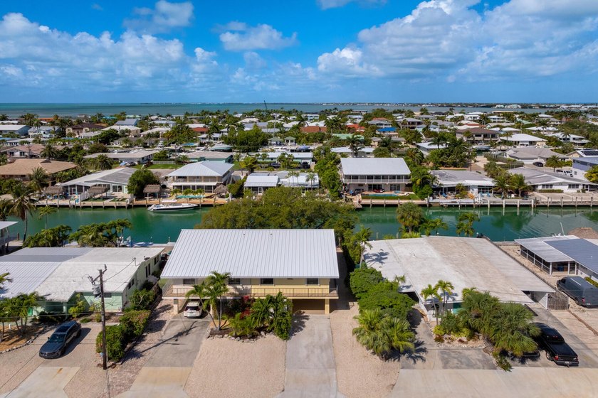 Discover exceptional waterfront living in the heart of Key - photo 3