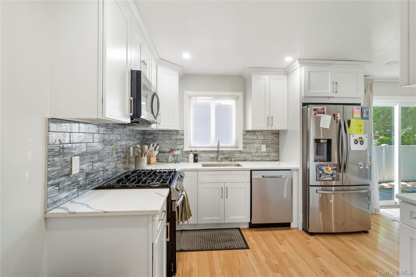 Welcome to 15 Ford Drive W, Massapequa-a beautifully renovated - photo 9