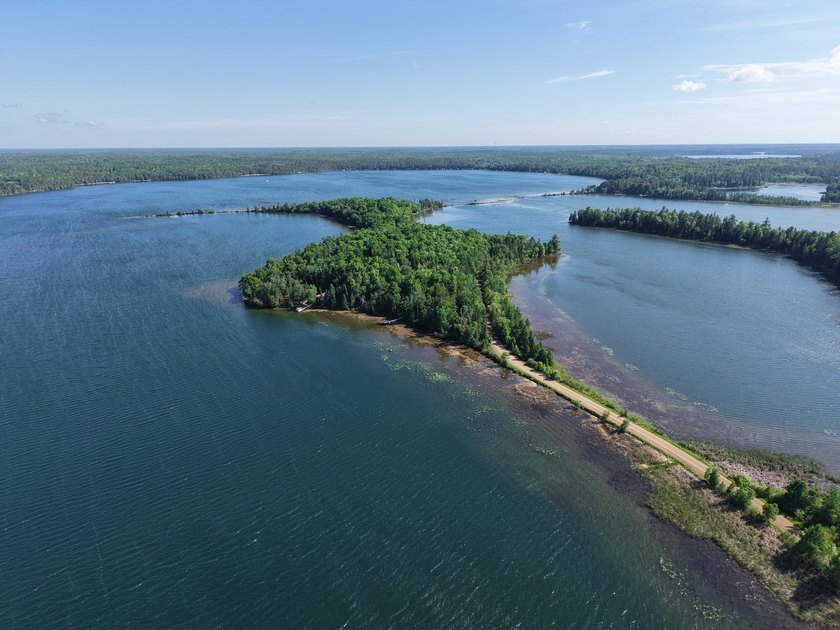 Discover your perfect escape on Mantrap Lake, one of the area's - photo 21