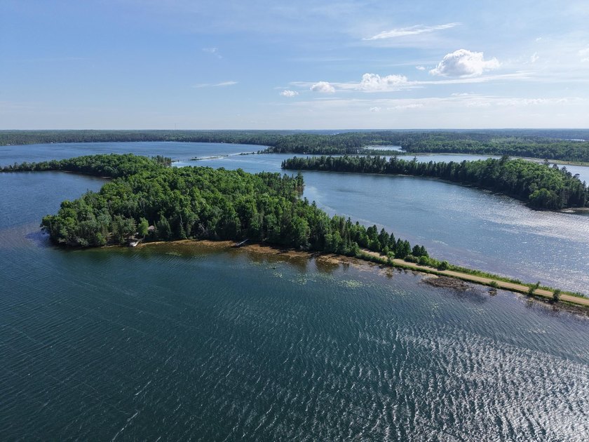 Discover your perfect escape on Mantrap Lake, one of the area's - photo 22