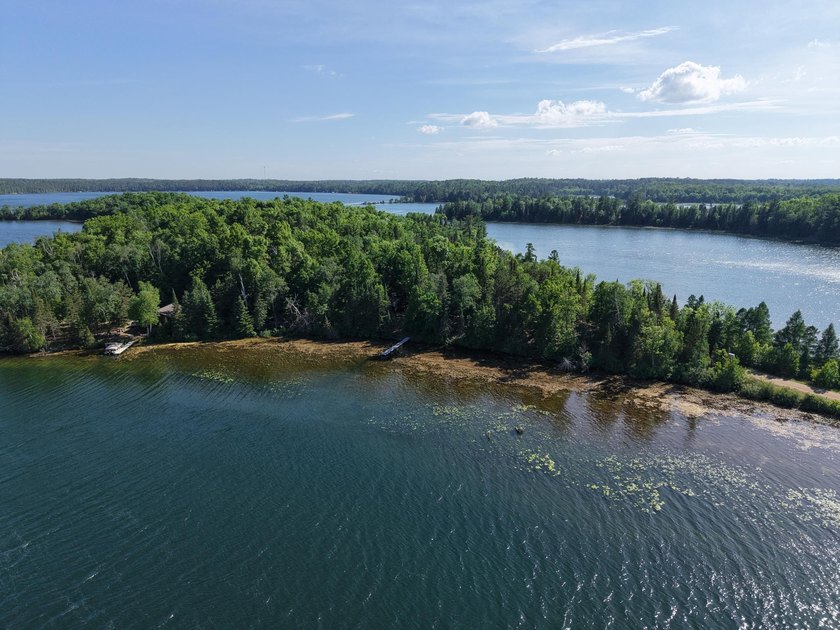 Discover your perfect escape on Mantrap Lake, one of the area's - photo 23