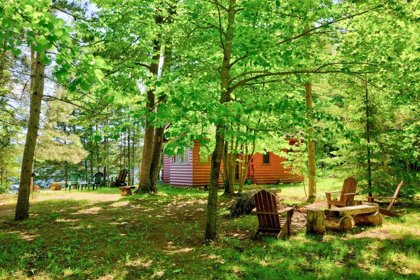Discover your perfect escape on Mantrap Lake, one of the area's - photo 29