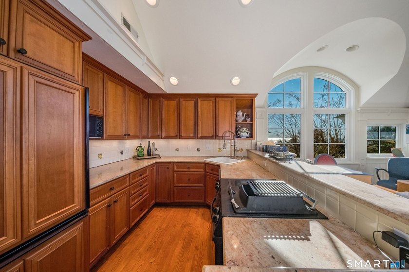 This magical light-filled New England 7,945 s.f. *cottage* takes - photo 34