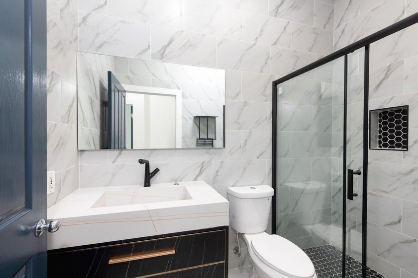 Welcome to this fully renovated 3-bedroom, 2.5-bathroom home - photo 11