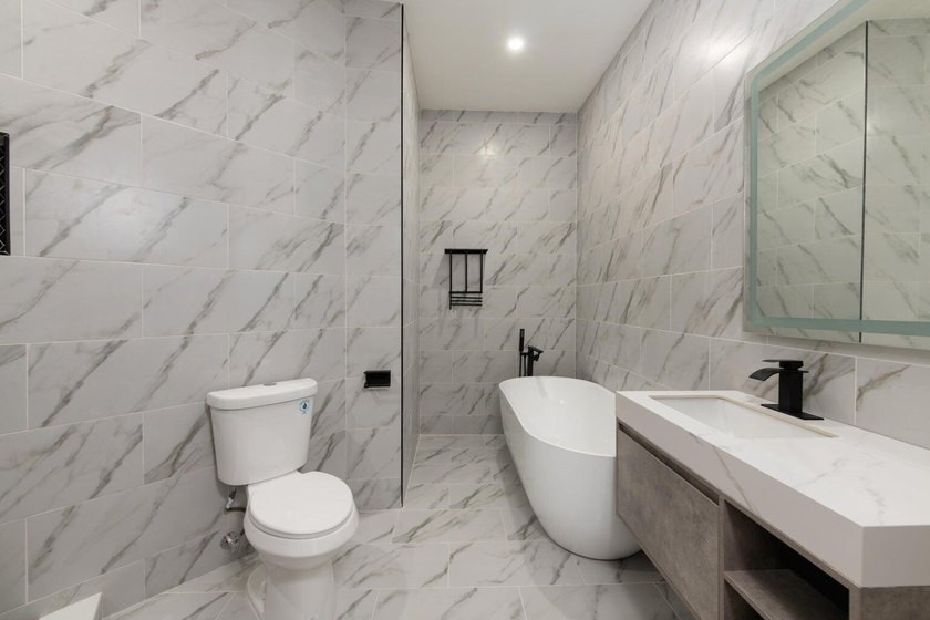 Welcome to this fully renovated 3-bedroom, 2.5-bathroom home - photo 13