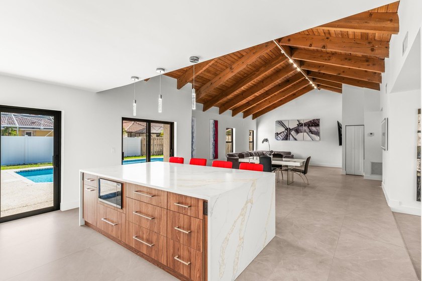 Stunning Modern Home with Heated Pool! Situated in desirable - photo 16