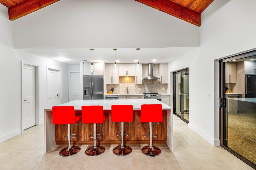 Stunning Modern Home with Heated Pool! Situated in desirable - photo 17