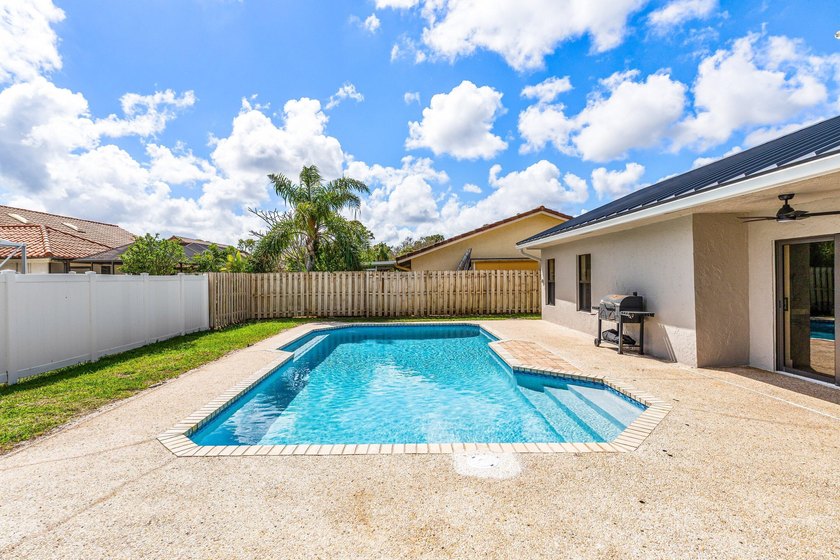 Stunning Modern Home with Heated Pool! Situated in desirable - photo 37