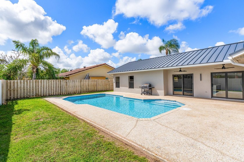 Stunning Modern Home with Heated Pool! Situated in desirable - photo 40