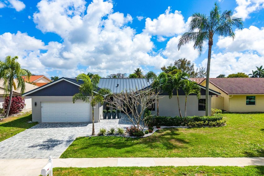 Stunning Modern Home with Heated Pool! Situated in desirable - photo 41