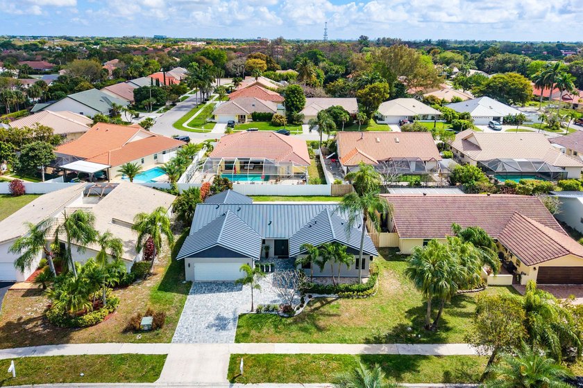 Stunning Modern Home with Heated Pool! Situated in desirable - photo 45