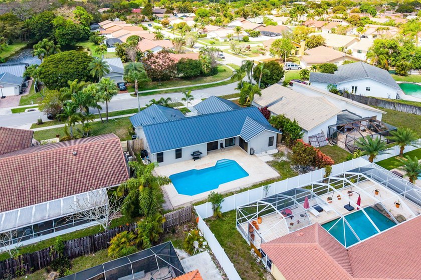 Stunning Modern Home with Heated Pool! Situated in desirable - photo 47
