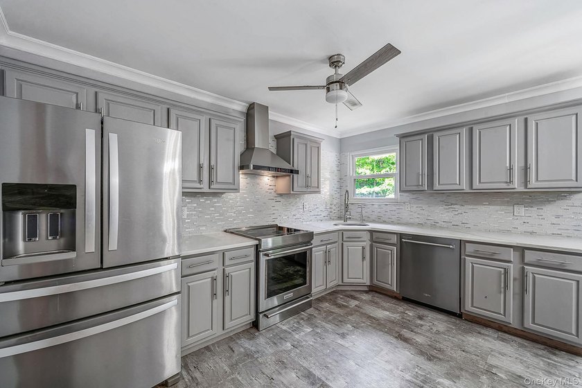 Welcome to 358 Tyler Avenue, Miller Place ! Find your next big - photo 6