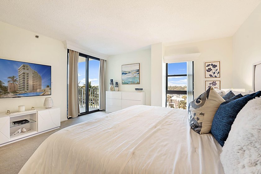 Experience the ultimate in oceanfront luxury with this rarely - photo 21