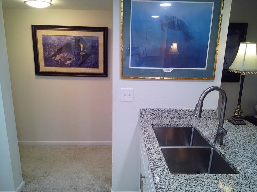 Beautifully maintained ground-floor condo located in the - photo 3