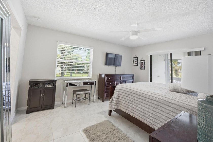 Step into this deluxe, completely renovated model featuring an - photo 9