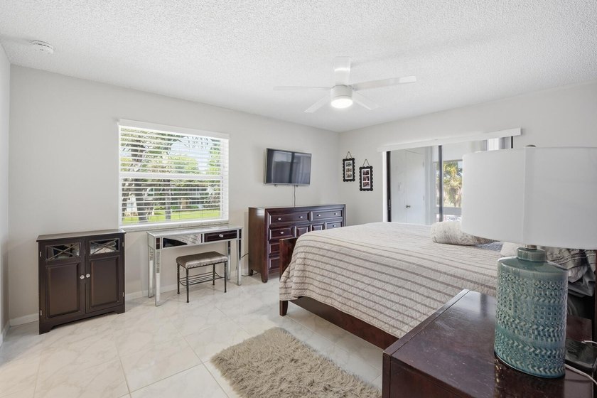 Step into this deluxe, completely renovated model featuring an - photo 10