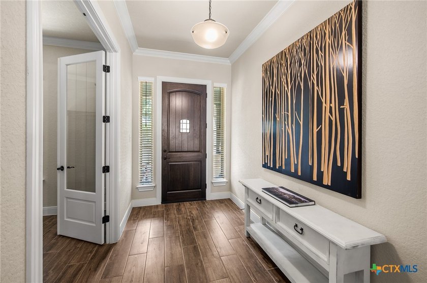 CUSTOM BUILT HOME IN A VERY PRIVATE SECLUDED NEIGHBORHOOD AWAY - photo 3