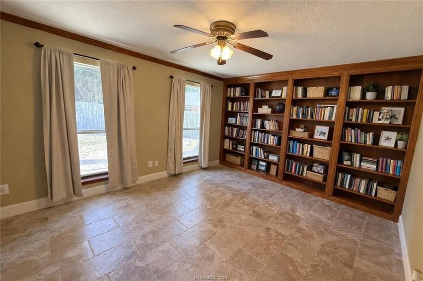 Situated on nearly three-quarters of an acre beneath mature - photo 14
