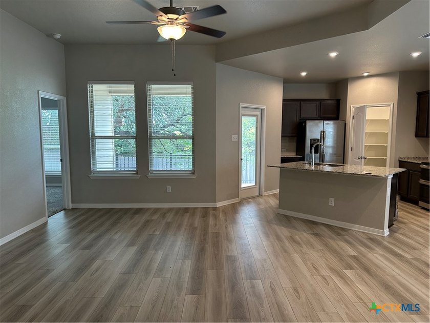 An OMEGA Home in Three Creeks which offers access to the - photo 4