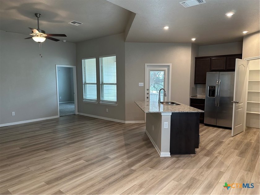 An OMEGA Home in Three Creeks which offers access to the - photo 6