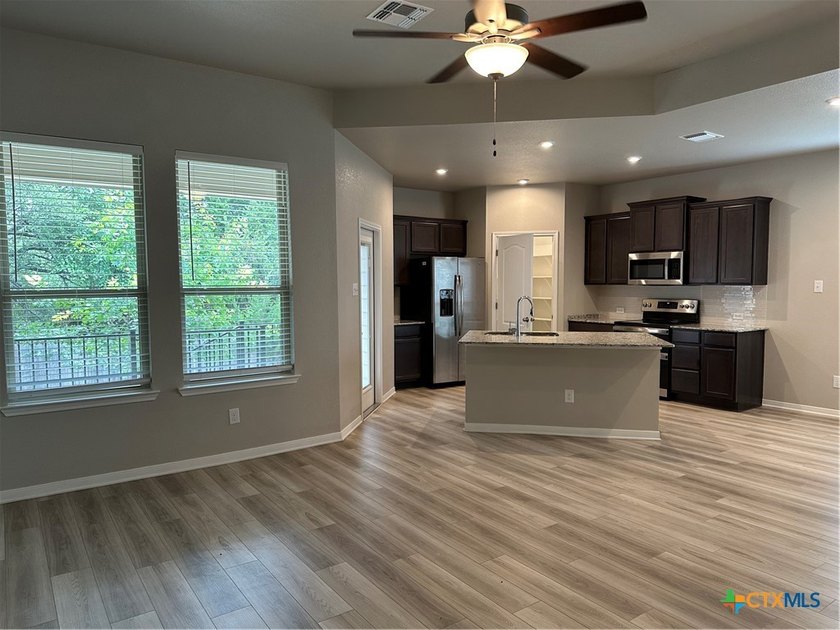 An OMEGA Home in Three Creeks which offers access to the - photo 7