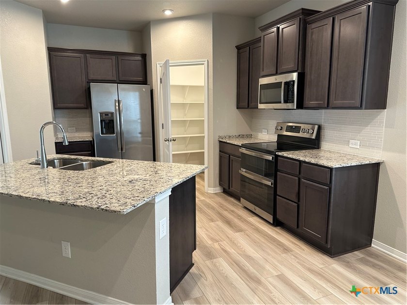 An OMEGA Home in Three Creeks which offers access to the - photo 8