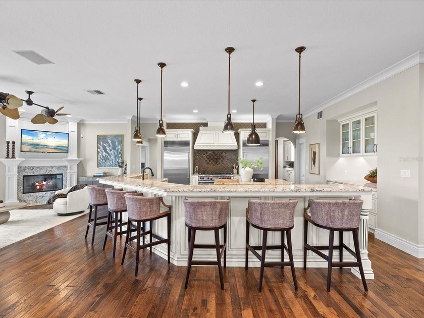 Welcome to an extraordinary waterfront estate in the prestigious - photo 11