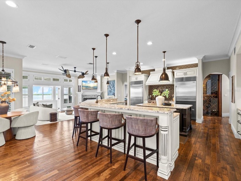 Welcome to an extraordinary waterfront estate in the prestigious - photo 15