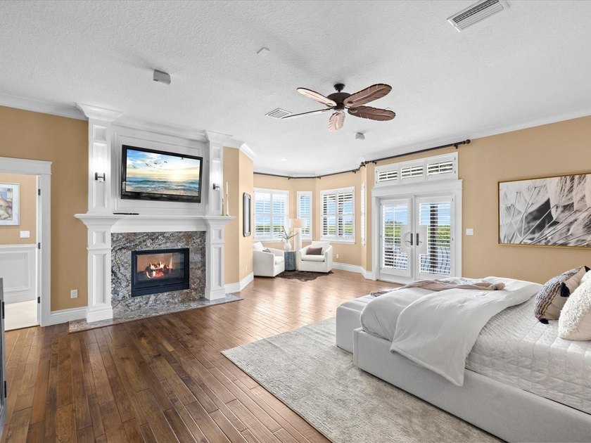 Welcome to an extraordinary waterfront estate in the prestigious - photo 18
