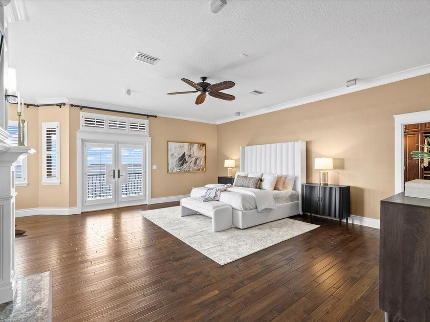 Welcome to an extraordinary waterfront estate in the prestigious - photo 19