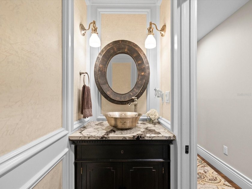Welcome to an extraordinary waterfront estate in the prestigious - photo 36