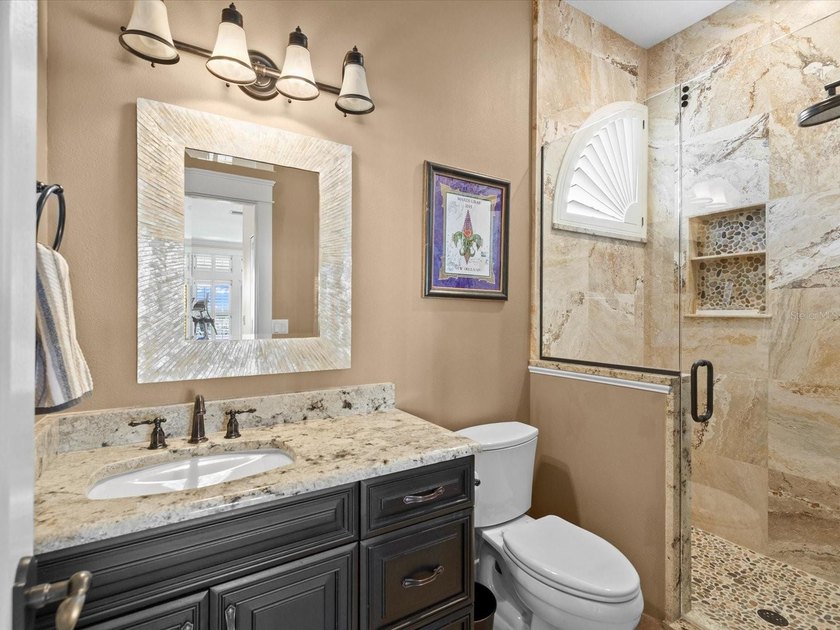 Welcome to an extraordinary waterfront estate in the prestigious - photo 43