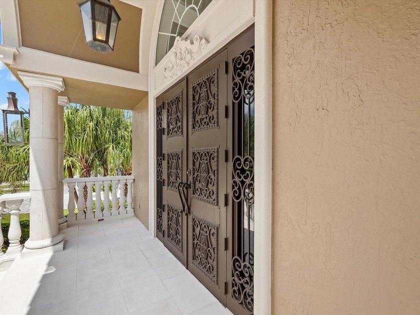 Welcome to an extraordinary waterfront estate in the prestigious - photo 45