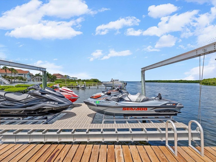 Welcome to an extraordinary waterfront estate in the prestigious - photo 50