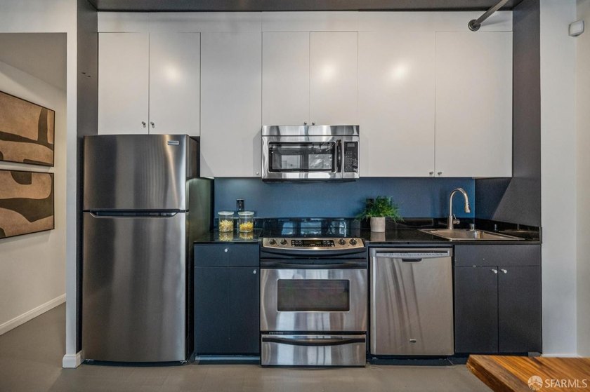 This architecturally notable live/work loft designed by Stanley - photo 12