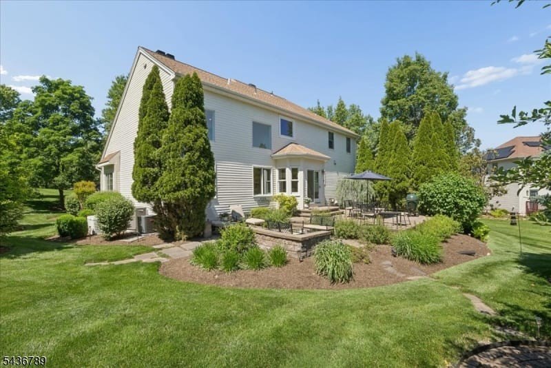 Positioned on a generous corner lot at the entrance to a quiet - photo 39