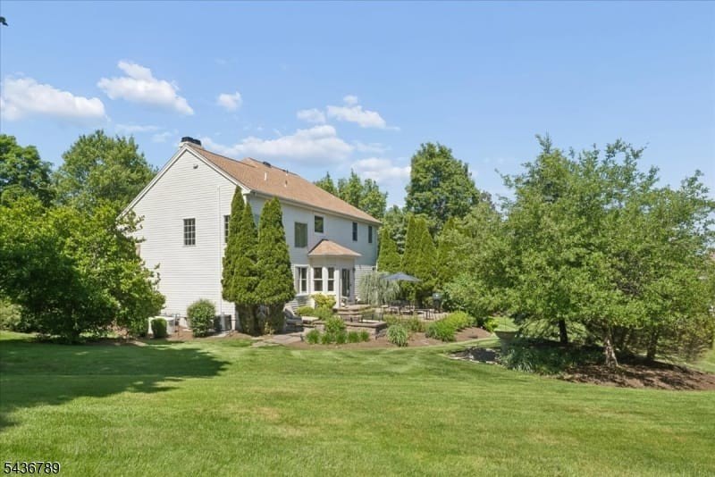 Positioned on a generous corner lot at the entrance to a quiet - photo 40