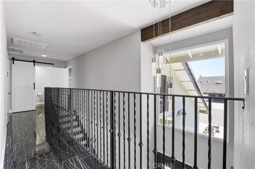 A home with room to live, work, gather, and unwind. Located at - photo 16
