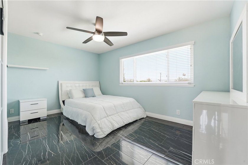 A home with room to live, work, gather, and unwind. Located at - photo 22