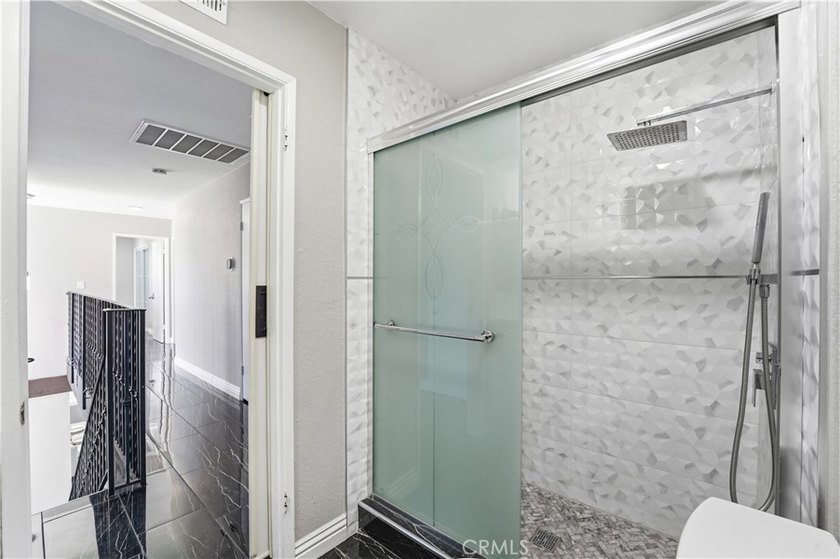 A home with room to live, work, gather, and unwind. Located at - photo 32
