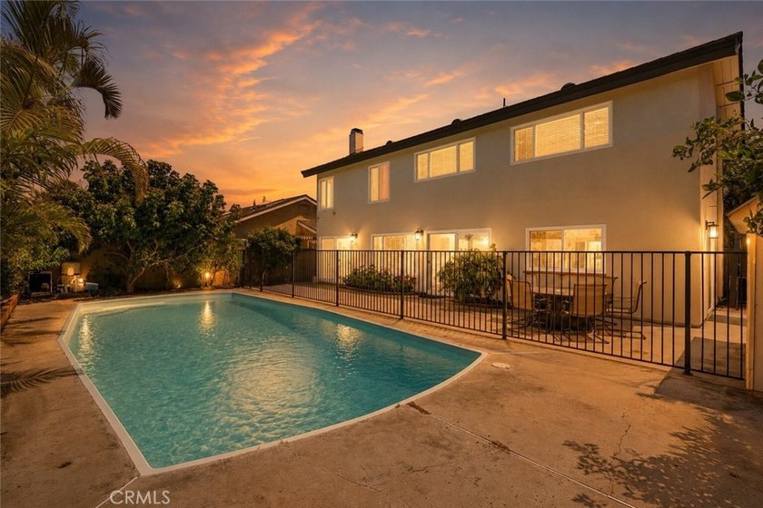 A home with room to live, work, gather, and unwind. Located at - photo 40