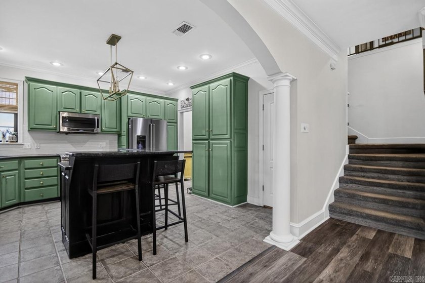 Welcome home to this beautifully designed 4-bedroom, 2.5-bath - photo 10