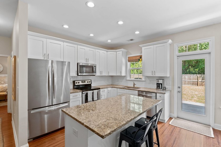 Welcome to 3362 Berryhill Road, where comfort, convenience, and - photo 4