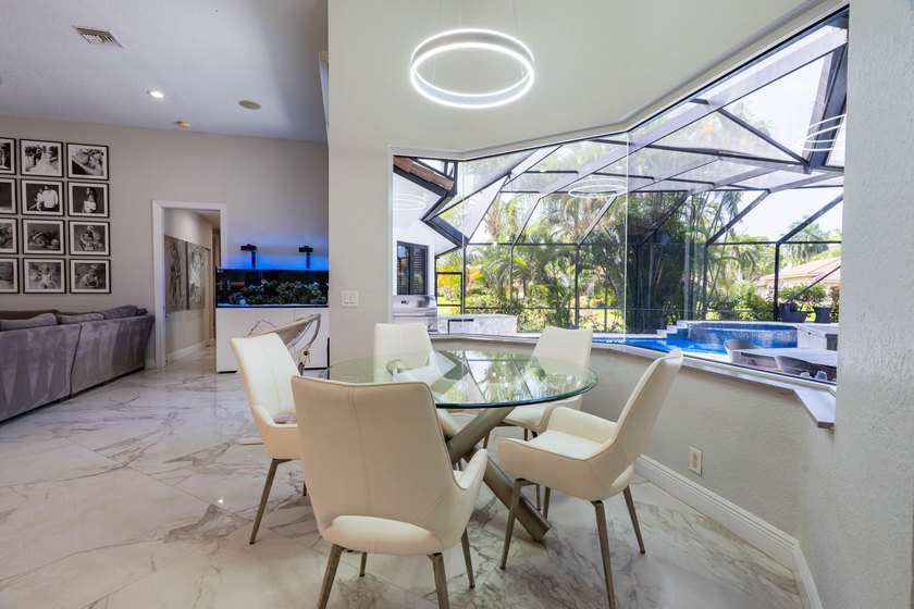 Welcome to this fully renovated lakefront home tucked away on a - photo 13