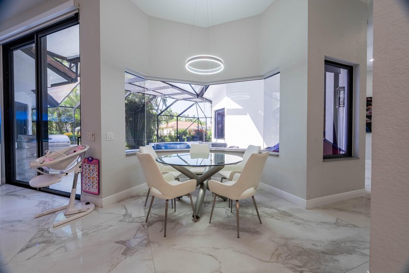 Welcome to this fully renovated lakefront home tucked away on a - photo 14